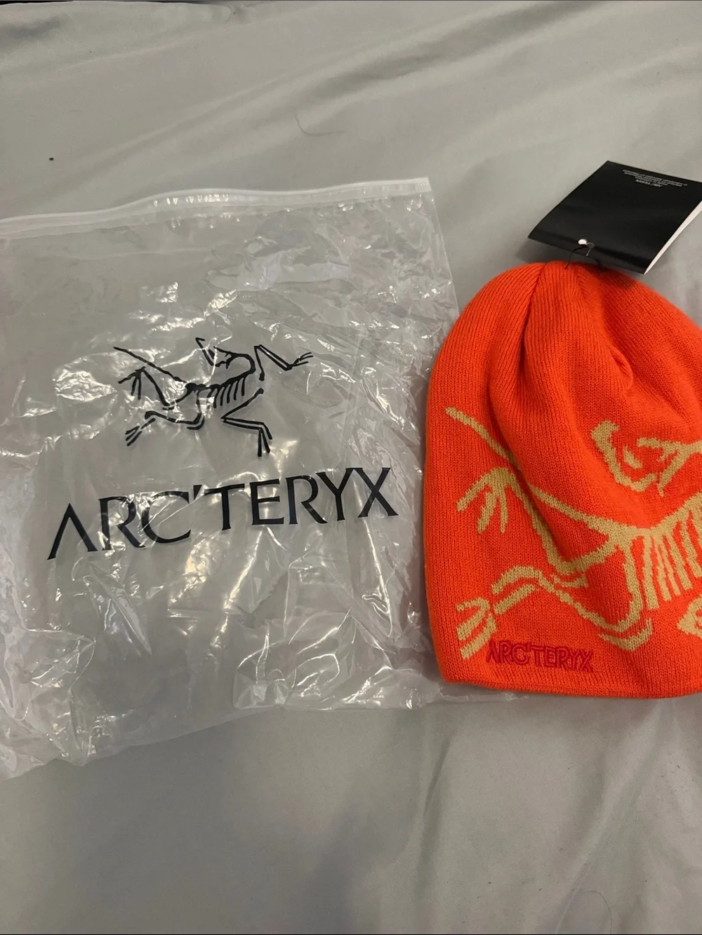 Arc'teryx Kids Bright Orange Beanie with Yellow Logo